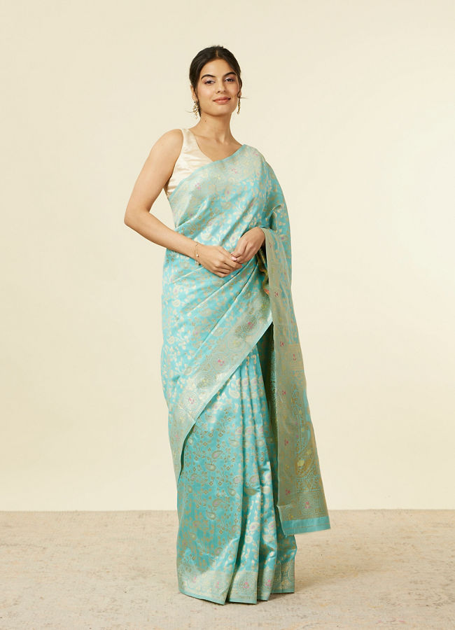 alt message - Mohey Women Light Blue Floral Zari Work Saree image number 0